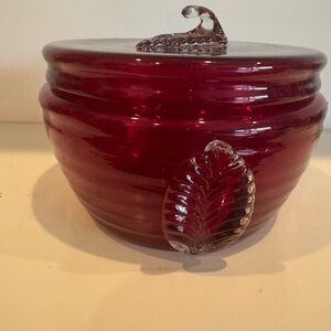 Elegant Red Glass Jar with Leaf Design